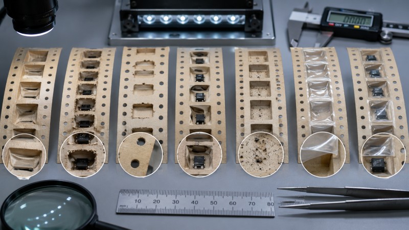 Examples of common paper carrier tape defects including pocket deformation and sprocket hole errors